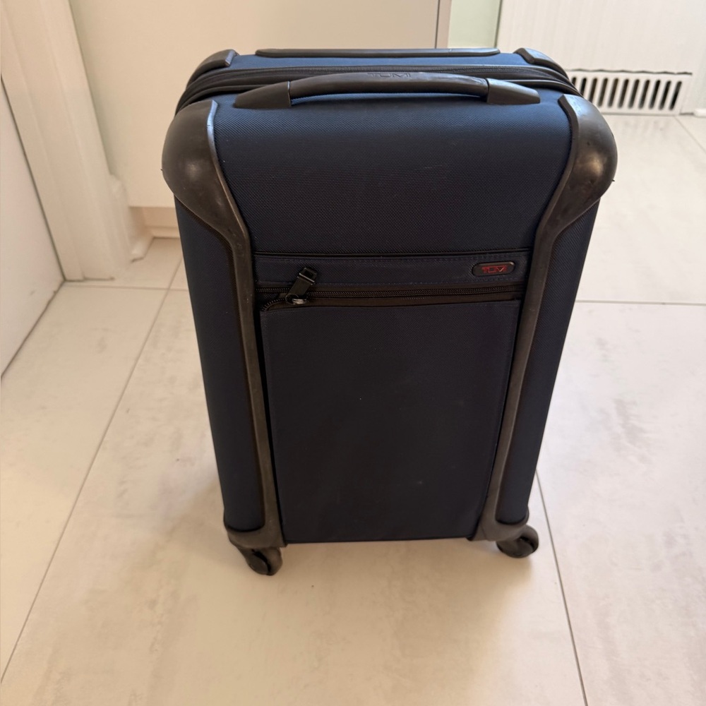 Tumi Navy Spinner Suitcase